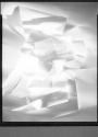 [Cut paper abstraction]
