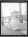 [Woman on porch]