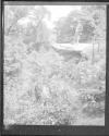 [Man standing on rock formation]