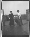 [Gertrude G. Fisher And Laura M. Fisher On Rooftop]