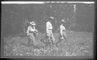 Man & 2 women in field, Wyoming Trip