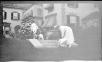 Woman in Eastman's garden with Dryden children and Watson Newhall