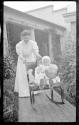 Nell Newhall with George Eastman Dryden and Watson Newhall in Eastman's garden