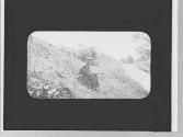 Man sitting by the wayside