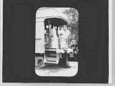 George Eastman and companions at back of train