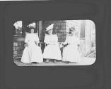 Marie Willard, May Gifford and Josephine Dickman on porch, Oak Lodge Trip