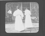 Women photographing George Eastman by house, Oak Lodge Trip