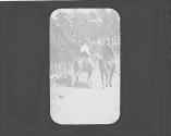 Two people on horse, Oak Lodge Trip