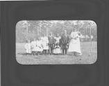 African American family posed in field, Oak Lodge Trip