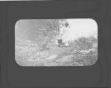Woman carrying bucket, Adirondacks Trip