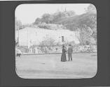 Man and woman talking in square