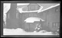 [Front of snow covered house]
