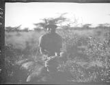 Phil's gun boy with Audley Stewart's lion, African Safari
