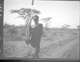 Native man along road on trip north, African Safari