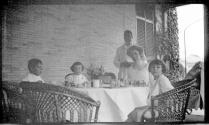 Ellen Dryden with children at picnic table