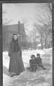 Woman with Dryden children in sled