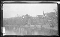 [View of town along river]