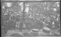 [Group of people along parade route]