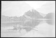 [Double exposure-people in rowboat/river landscape]