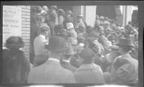 [Group of people on steps of church]