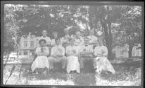 [Group portrait in park]