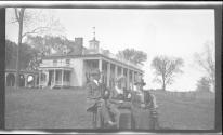 [People on bench in front of Mt. Vernon]