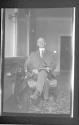 [Man in chair]