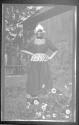 [Woman in native costume]