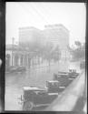 [Street scene with automobiles]