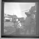 Children and adults on street