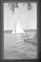 [Sailboat & motorboat on lake]