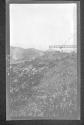 [View down into construc tion site in river - dam (?)]