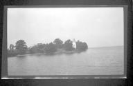 [Lighthouse along river]