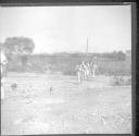 Men walking on road