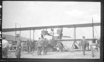 Men with early type airplane, Aviation Meet