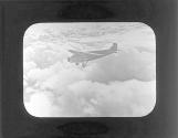Airplane above clouds