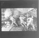Stoking Retorto at a Gasworks