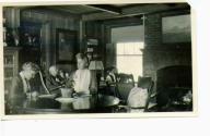 Interior, George Eastman and guests in sitting room, Oak Lodge Trip