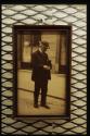 George Eastman holding camera