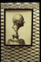 Framed photograph of bronze sculpture of George Eastman