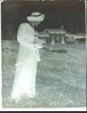 Woman using Folding Pocket Kodak camera