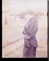 Woman using Folding Pocket Kodak Camera