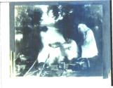 Man processing negatives with Kodak Film Tank