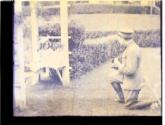 Army officer photographing children