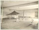 Eastman's tent set up inside garage