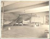Eastman's camping tent set up inside garage