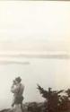 Man photographing lake, Pacific Coast Trip