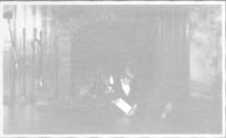 Interior, Watson Newhall by fireplace, Grand Cascapedia Trip