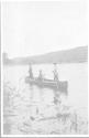 George Eastman being rowed in canoe, Grand Cascapedia Trip
