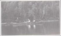 Three men in canoe, Grand Cascapedia Trip